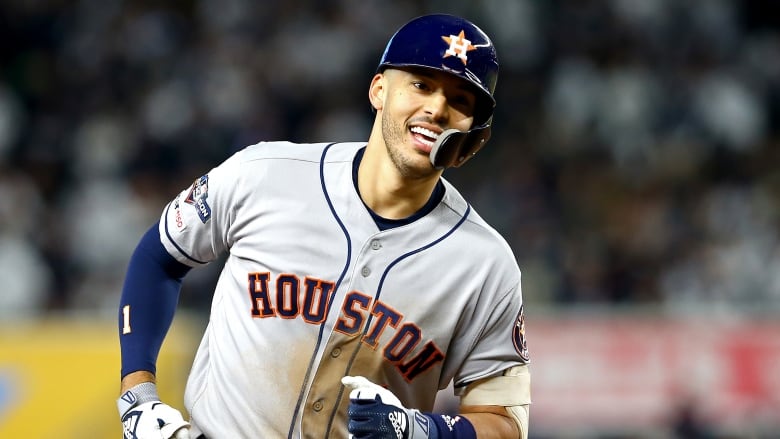 Houston’s Carlos Correa celebrates his three-run home run during the sixth ...